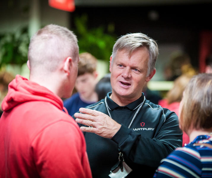 Open Day Staff Member Talking To Young Person