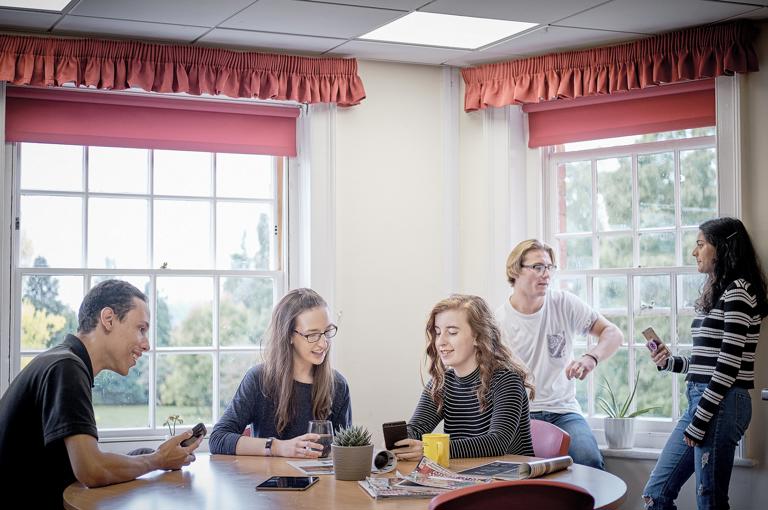 Group Of Five Students Relaxing In Hartpury House Accommodation