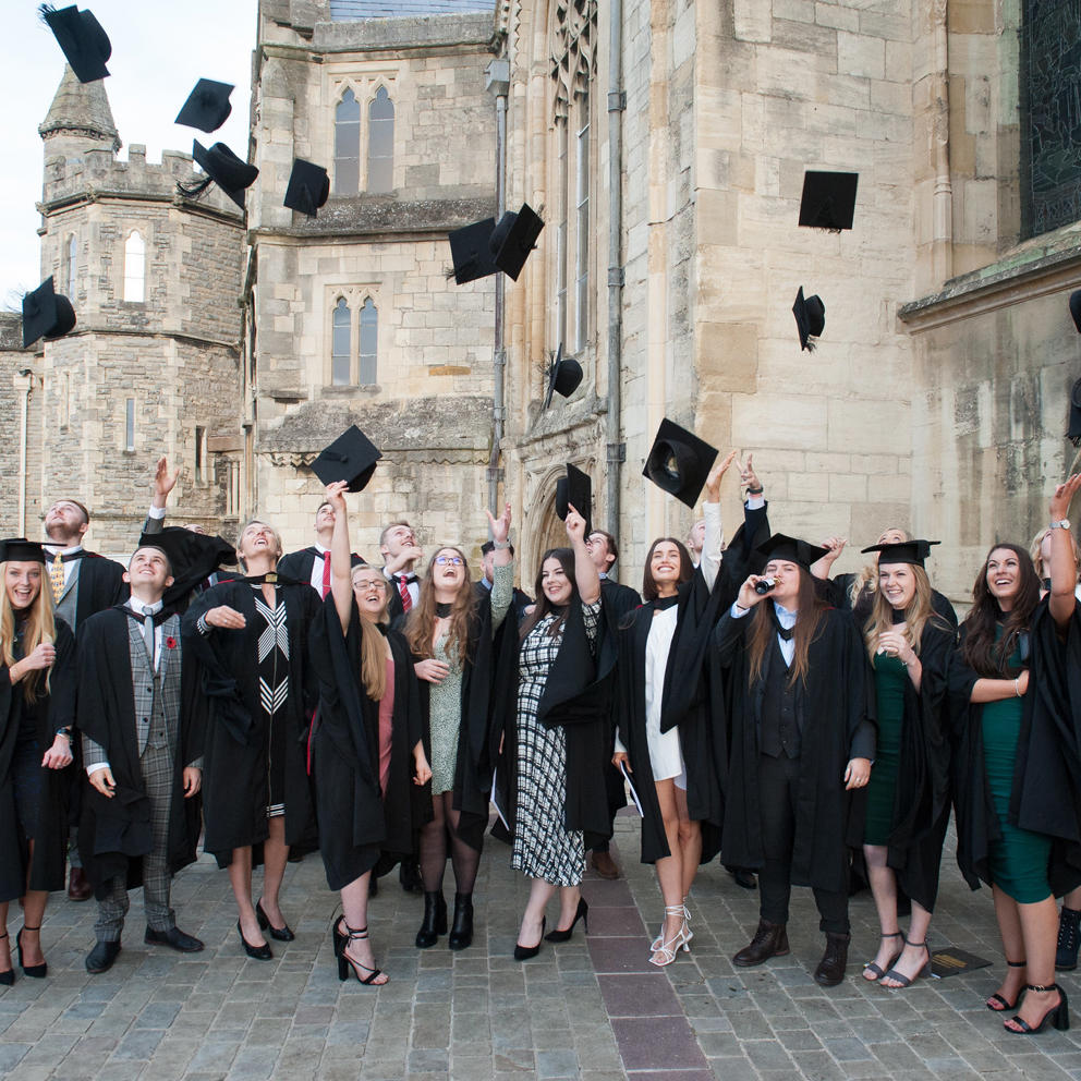 Graduation Hat Throwing Outside Gloucester Cathedral