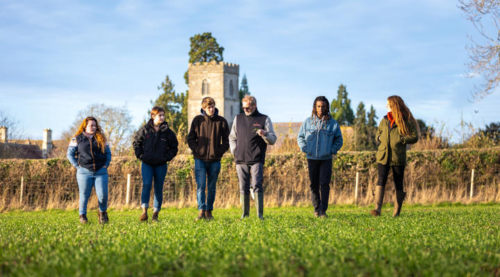 Students And Lecturer On Crop Walk