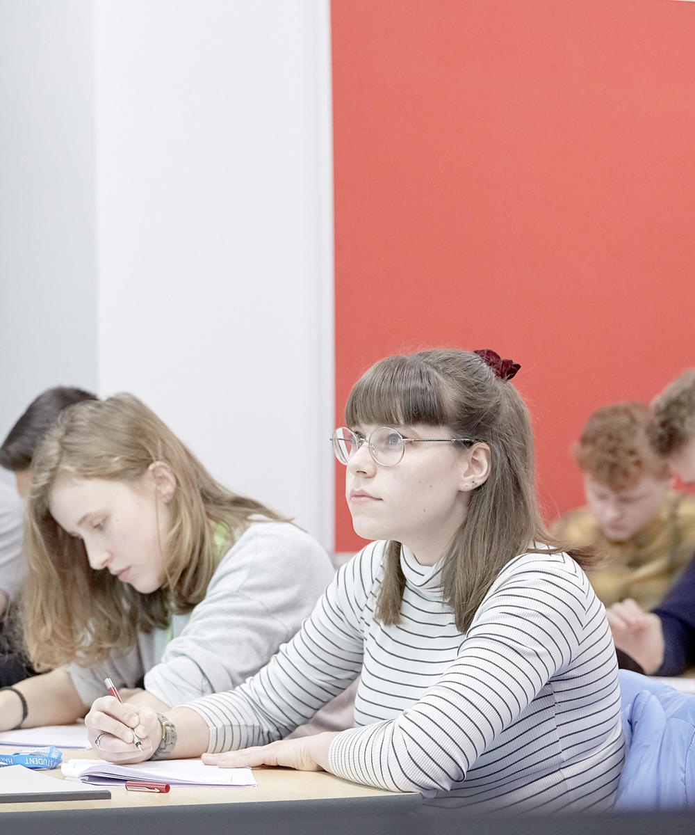 Female A Level Student Studying In Classroom