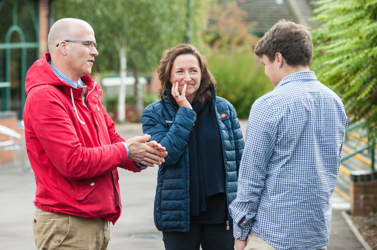 Head Of Agriculture Talking To Open Day Guests